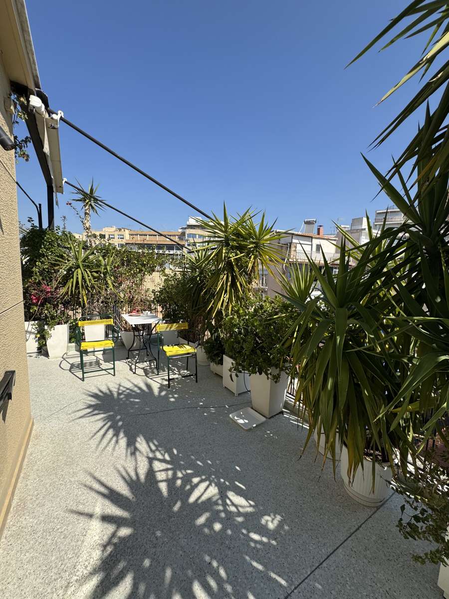 Overview of the veranda with seating and plants, Monastiraki, Athens
